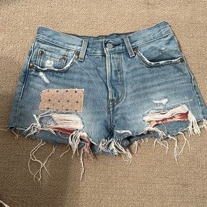Ripped high waisted shorts.